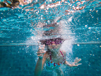 Portrait of girl in swimming pool