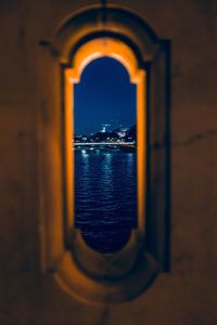 View of sea seen through arch