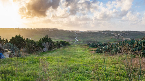 Scenic view of land against sky