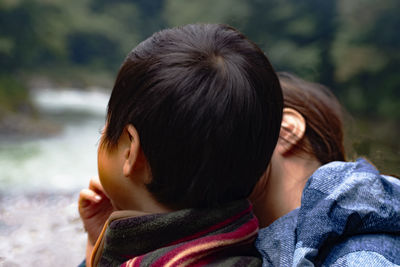 Close-up portrait of a cute baby outdoors