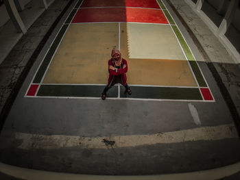 High angle view of man with umbrella