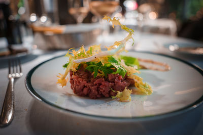 Close-up of food in plate on table