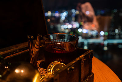 Close-up of illuminated drink on table at restaurant