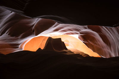 Low angle view of red rocks