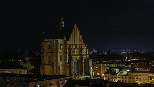 View of illuminated buildings at night