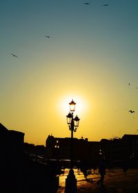 Silhouette of street at sunset