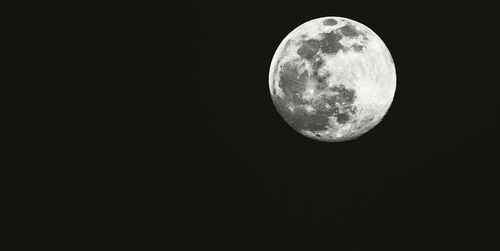 Low angle view of moon in sky