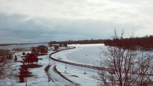 Scenic view of frozen lake against sky