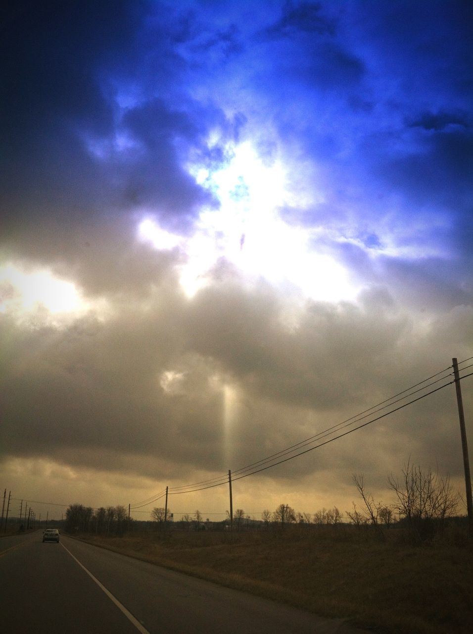 sky, electricity pylon, power line, cloud - sky, electricity, power supply, connection, landscape, sunset, cloudy, fuel and power generation, cloud, sun, road, transportation, tranquility, nature, sunlight, cable, field