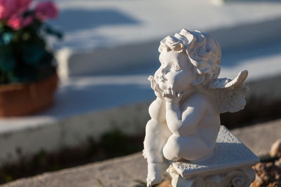 Close-up of statue against blurred background