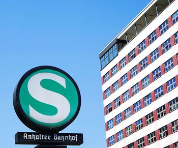 Low angle view of building against clear blue sky