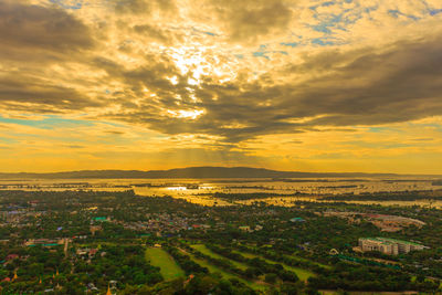 Scenic view of landscape against sky during sunset