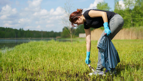 Side view of woman on field