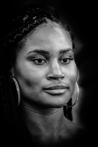 Close-up portrait of a smiling young woman