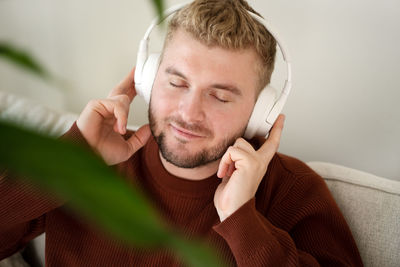 Close-up of young man with headphones 