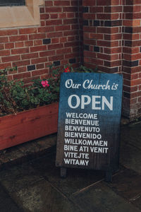 Information sign on brick wall