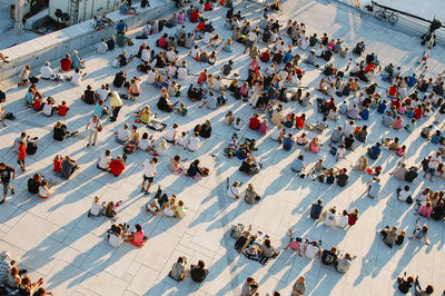 High angle view of people sitting at oslo opera house