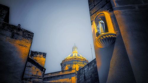 Low angle view of traditional building against sky