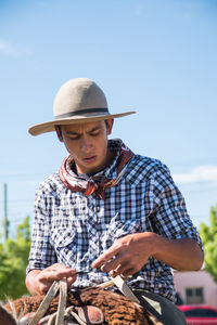 Argentinian man riding horse