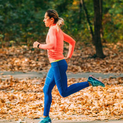 Woman jogging. nature, outdoor park