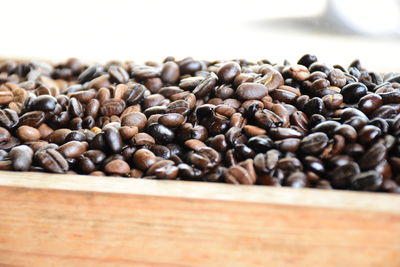 Close-up of coffee beans on table