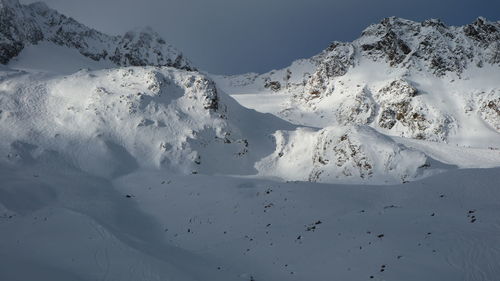 Snow covered mountain against sky