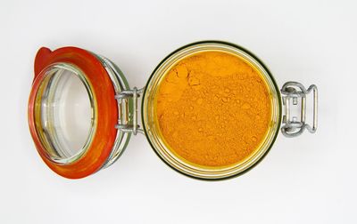 Directly above shot of glass jar on white background