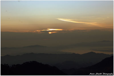 Silhouette of mountains at sunset