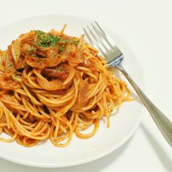 Close-up of noodles in plate on table