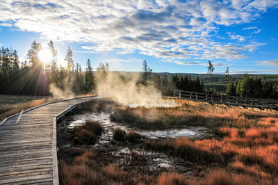 Panoramic view of railroad tracks against sky