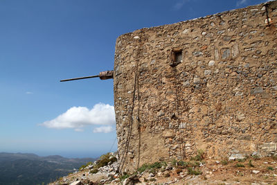 Ruins of ancient venetian windmills built in 15th century, lassithi plateau, crete, greece