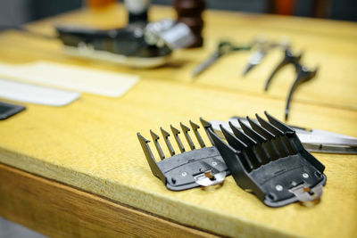 Close-up of equipment on table