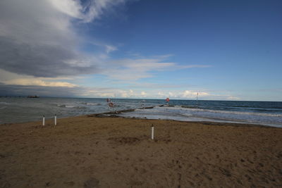 Scenic view of beach against sky