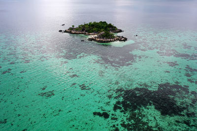 High angle view of rocks in sea