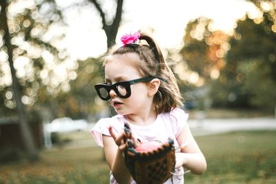 Portrait of cute girl wearing sunglasses