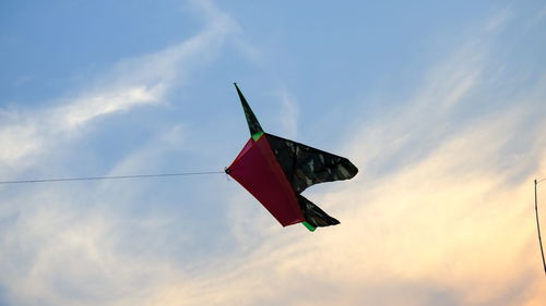 Low angle view of flag against sky