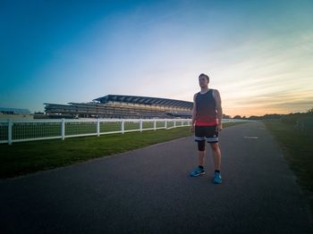 A runner ready to run at sunset