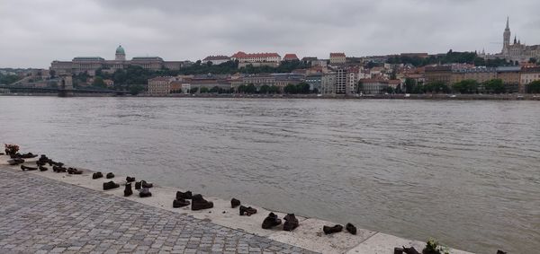 High angle view of buildings by river