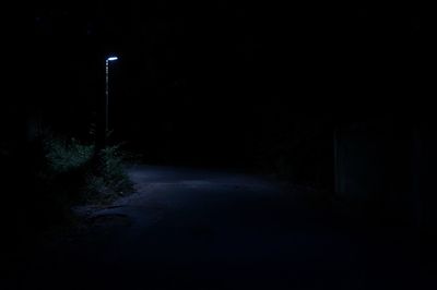 Illuminated road at night