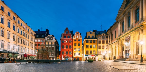 Canal amidst buildings in city