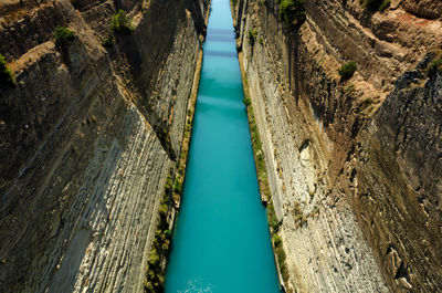 High angle view of river amidst rocky mountains