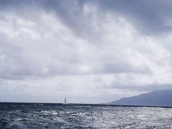 View of sea against cloudy sky