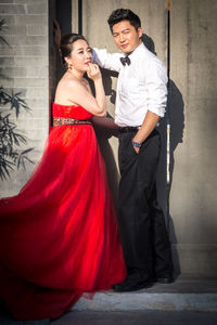 Young couple standing outdoors