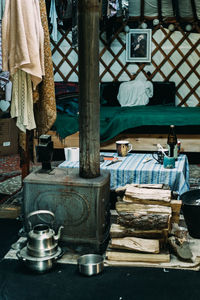 Low section of woman standing in factory