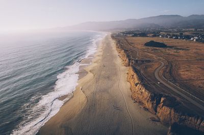 Panoramic view of beach against clear sky