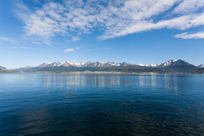 Scenic view of lake against blue sky