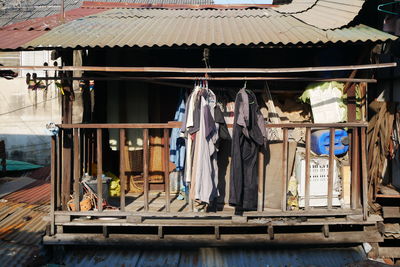 Clothes drying on roof of building