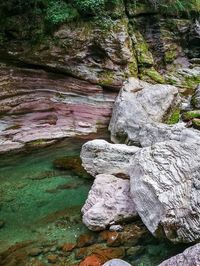 Close-up of rock formation in lake