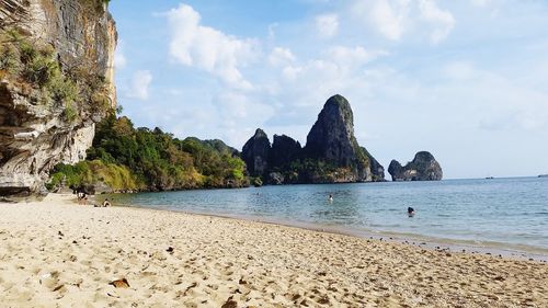 Panoramic view of sea and rocks against sky