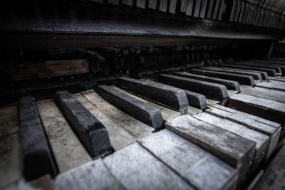 Close-up of an old, weather-beaten piano. 